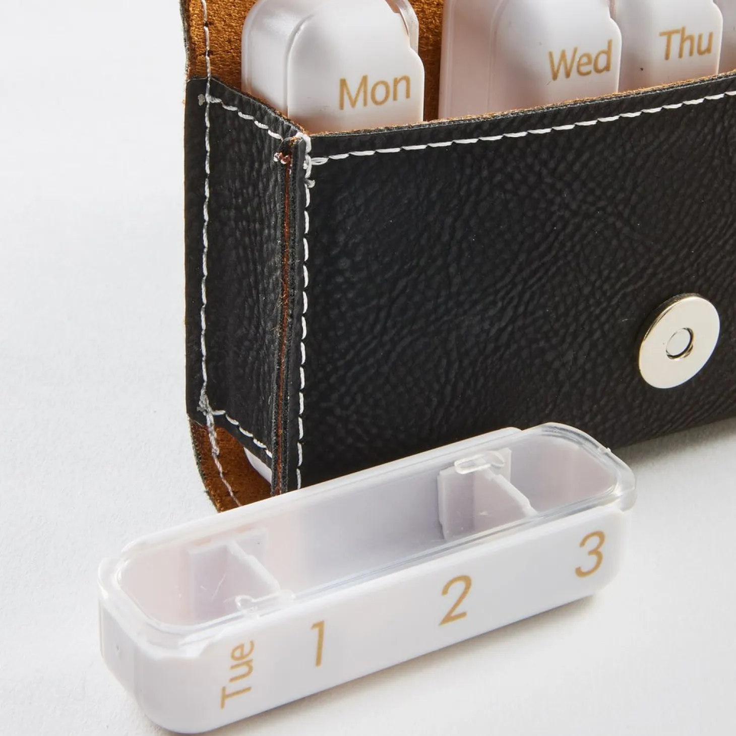 Athletic Name Travel Pill Organizer .product-info-decoration { display: inline-flex; justify-content: space-between; align-items: center; border-radius: 0.4rem; background-color: #E8E8E8; padding: 0.2rem 0.4rem; font-size: 1.4rem; line-height: 1.6rem; font-weight: var(--font-weight-semibold); letter-spacing: 0.042rem; text-transform: uppercase; --decoration-icon-url: ''; /* will be dynamically set */}.product-info-decoration.badge-icon::before { content: ''; width: 2rem; height: 2rem; background: var(--decoration-icon-url) no-repeat; background-size: 100% 100%; display: block; margin-right: 0.4rem;} Laser Engraved