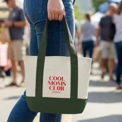Cool Moms Club Mini Tote Bag .product-info-decoration { display: inline-flex; justify-content: space-between; align-items: center; border-radius: 0.4rem; background-color: #E8E8E8; padding: 0.2rem 0.4rem; font-size: 1.4rem; line-height: 1.6rem; font-weight: var(--font-weight-semibold); letter-spacing: 0.042rem; text-transform: uppercase; --decoration-icon-url: ''; /* will be dynamically set */}.product-info-decoration.badge-icon::before { content: ''; width: 2rem; height: 2rem; background: var(--decoration-icon-url) no-repeat; background-size: 100% 100%; display: block; margin-right: 0.4rem;} FULL-COLOR CUSTOMIZATION