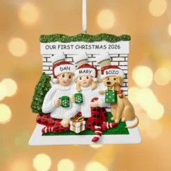 Cozy Fireplace Couple with Dog Ornament