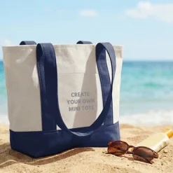Create Your Own Mini Tote Bag .product-info-decoration { display: inline-flex; justify-content: space-between; align-items: center; border-radius: 0.4rem; background-color: #E8E8E8; padding: 0.2rem 0.4rem; font-size: 1.4rem; line-height: 1.6rem; font-weight: var(--font-weight-semibold); letter-spacing: 0.042rem; text-transform: uppercase; --decoration-icon-url: ''; /* will be dynamically set */}.product-info-decoration.badge-icon::before { content: ''; width: 2rem; height: 2rem; background: var(--decoration-icon-url) no-repeat; background-size: 100% 100%; display: block; margin-right: 0.4rem;} FULL-COLOR CUSTOMIZATION