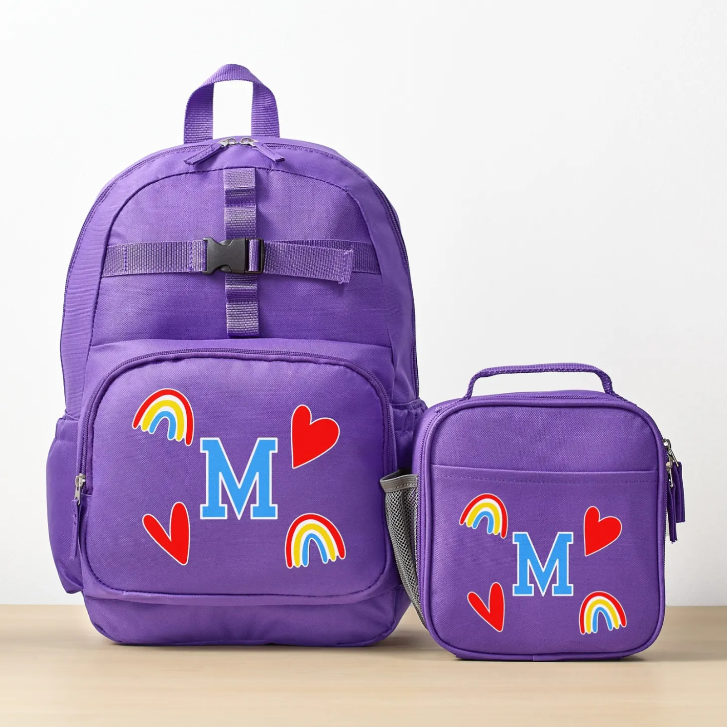 Decal + Monogram Purple Backpack Collection