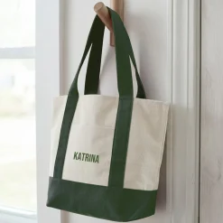 Name Mini Tote Bag .product-info-decoration { display: inline-flex; justify-content: space-between; align-items: center; border-radius: 0.4rem; background-color: #E8E8E8; padding: 0.2rem 0.4rem; font-size: 1.4rem; line-height: 1.6rem; font-weight: var(--font-weight-semibold); letter-spacing: 0.042rem; text-transform: uppercase; --decoration-icon-url: ''; /* will be dynamically set */}.product-info-decoration.badge-icon::before { content: ''; width: 2rem; height: 2rem; background: var(--decoration-icon-url) no-repeat; background-size: 100% 100%; display: block; margin-right: 0.4rem;} FULL-COLOR CUSTOMIZATION