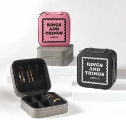 Rings and Things Travel Jewelry Box .product-info-decoration { display: inline-flex; justify-content: space-between; align-items: center; border-radius: 0.4rem; background-color: #E8E8E8; padding: 0.2rem 0.4rem; font-size: 1.4rem; line-height: 1.6rem; font-weight: var(--font-weight-semibold); letter-spacing: 0.042rem; text-transform: uppercase; --decoration-icon-url: ''; /* will be dynamically set */}.product-info-decoration.badge-icon::before { content: ''; width: 2rem; height: 2rem; background: var(--decoration-icon-url) no-repeat; background-size: 100% 100%; display: block; margin-right: 0.4rem;} Laser Engraved